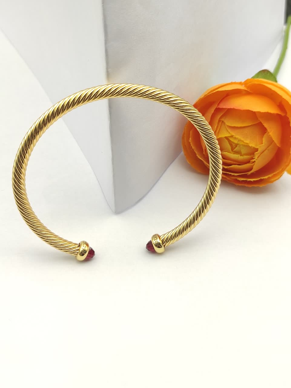 David Yurman Gold Tone Wire Bangle Bracelet with Red Gemstone